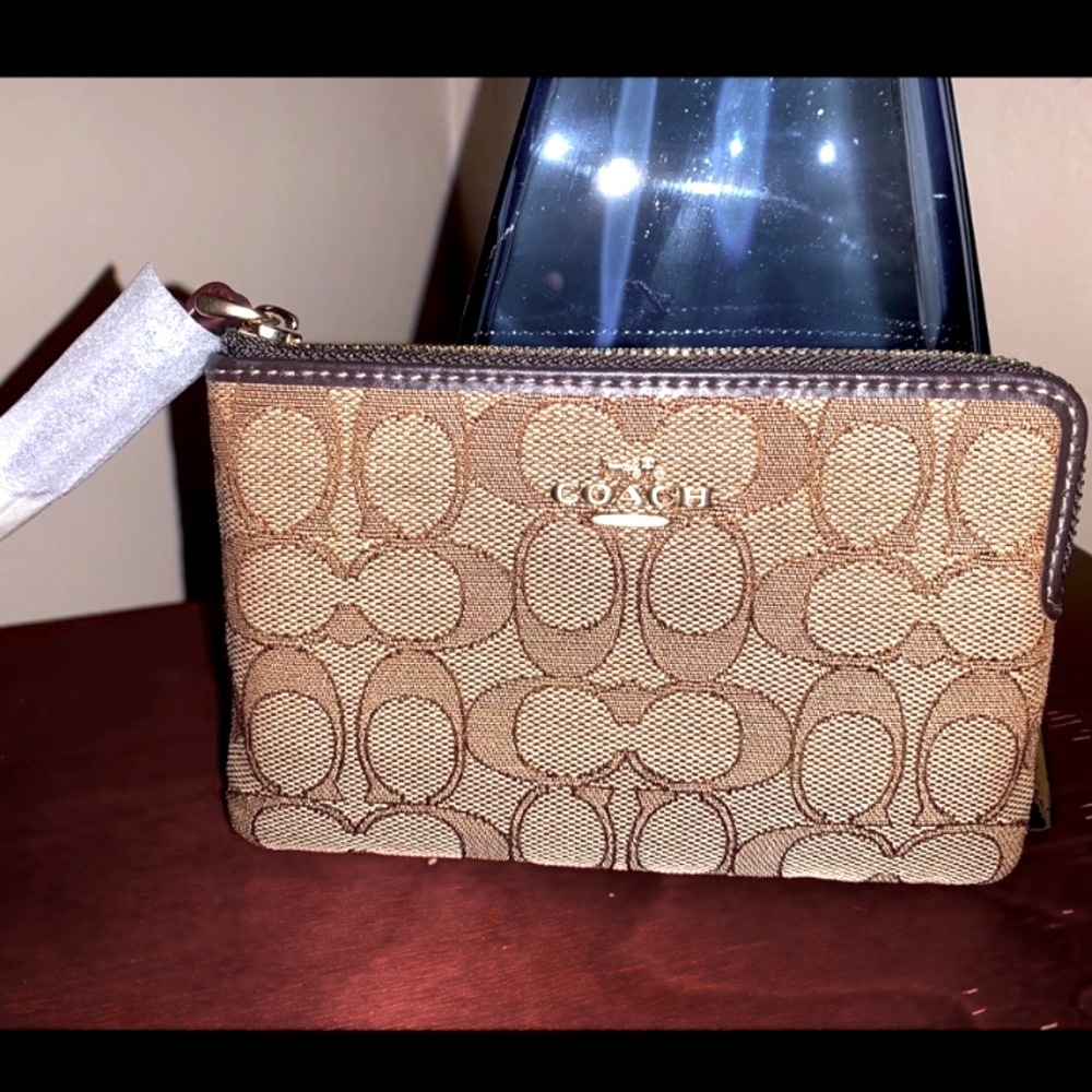 COACH zip around canvas logo wristlet